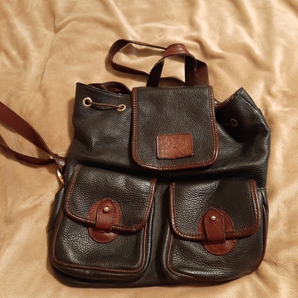 Vintage Valentina in Pell black and brown pebbled leather back pack. $100.